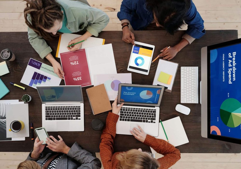 Collaborative brainstorming session with technology and creativity in a dynamic workspace.