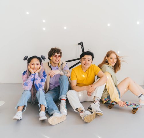 Cheerful friends enjoying quality time together in a bright, stylish setting.