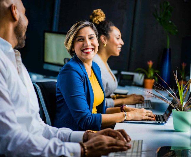 Dynamic teamwork in a bright, modern office with engaged professionals collaborating effectively.